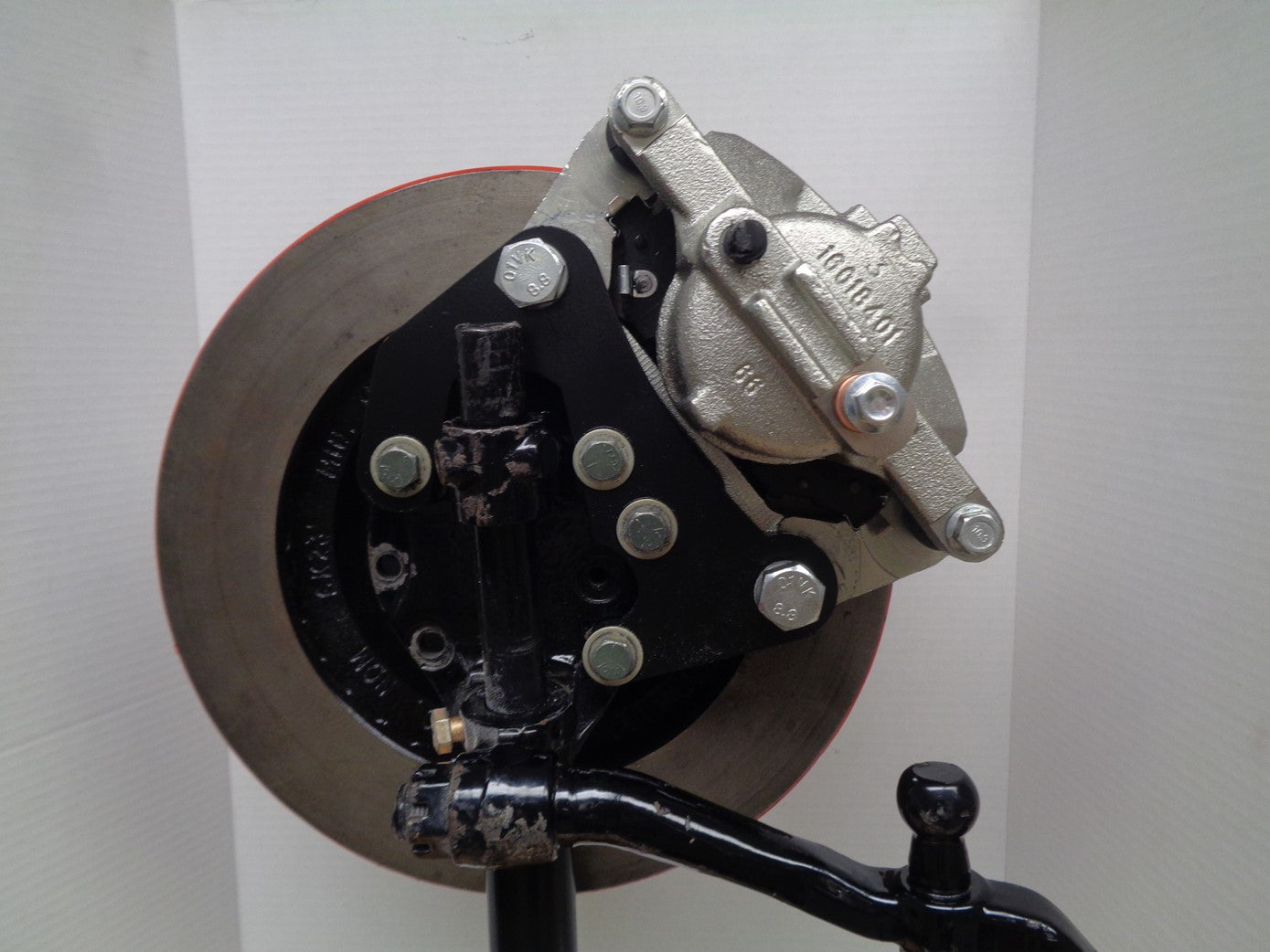 Close up Image of Turner Brake Right Side Bracket and Grease Seal Adapter Installed